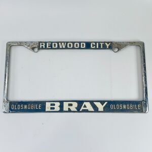 Vintage Redwood City Bray Oldsmobile Dealership License Plate Frame California